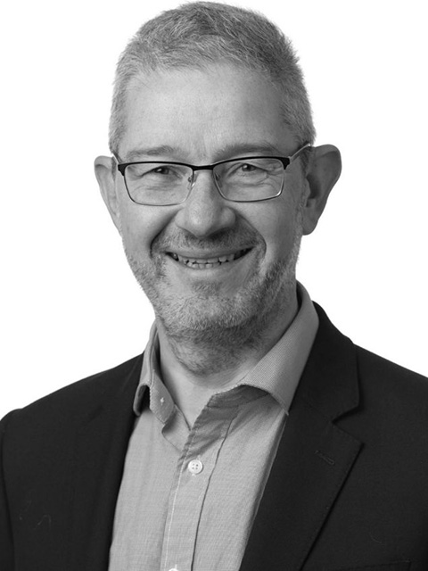 Portrait photograph of academic visitor to the School of Architecture, Building and Civil Engineering at Loughborough University, Matthew Raybould